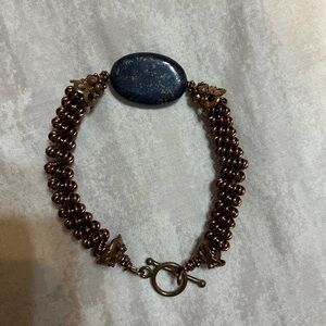 Vintage hippie bronze tone blue stone/pebble bracelet